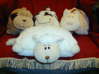 Our lovely cuddly cows. pigs and dogs, they fold up and stand proud or lie down to make a very soft pillow.